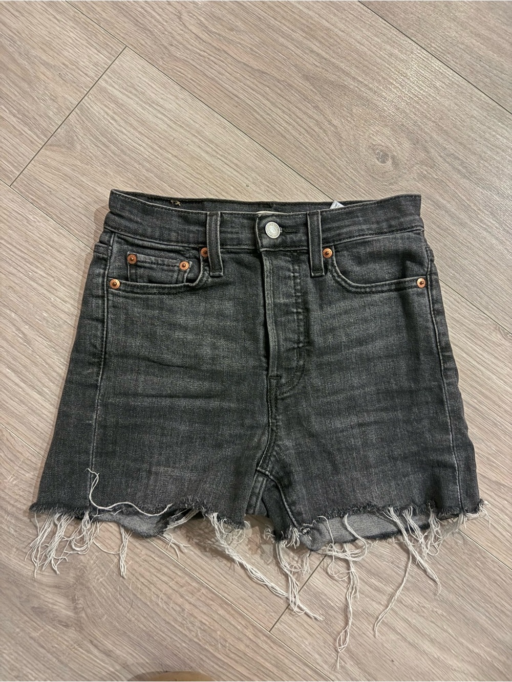 Levi's High-Rise Black Washed Frayed Hem Denim Shorts